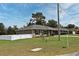 This charming home is situated on a well-maintained lot, complete with lush green grass at 116 Neal Dr, Deltona, FL 32738