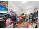 Cluttered bedroom space with natural light and personal decorations at 1228 Oakwood Ave, Daytona Beach, FL 32114