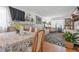 Open dining area features tile floors, and seamless flow into the living room at 1228 Oakwood Ave, Daytona Beach, FL 32114