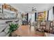 Bright dining area with tile flooring, ceiling fan, and open view into the kitchen space at 1228 Oakwood Ave, Daytona Beach, FL 32114