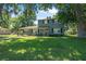 Charming home featuring a well-maintained front lawn and traditional architecture at 1228 Oakwood Ave, Daytona Beach, FL 32114