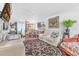 Comfortable living room with an open view to the dining area, creating an inviting and functional space at 1228 Oakwood Ave, Daytona Beach, FL 32114