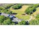 Stunning Jacksonville golf course with lush green fairways, sand traps, and a clubhouse, offering the perfect golfing experience at 1309 Wicklow Ln, Ormond Beach, FL 32174