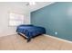 A bedroom with an open window and a bed at 1343 Rocky Rd, Kissimmee, FL 34744