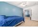 Bedroom featuring an open window and a large mirror at 1343 Rocky Rd, Kissimmee, FL 34744