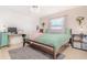 Bedroom with a desk, carpeted floor and a ceiling fan at 1343 Rocky Rd, Kissimmee, FL 34744