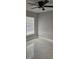 Bright and neutral bedroom featuring modern marble-look tile flooring at 1568 Pendleton St, Deltona, FL 32725