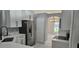 Well-equipped kitchen featuring stainless steel appliances, white cabinets and quartz countertops with a dining room view at 1568 Pendleton St, Deltona, FL 32725