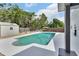 Backyard with an in-ground pool, an outdoor seating area, and a shed at 1590 Urbana Ave, Deltona, FL 32725