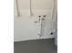 Utility area showing water pipes, electrical outlets, and hot water heater at 1590 Urbana Ave, Deltona, FL 32725