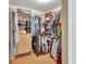 The walk-in closet includes built-in shelving and hanging storage at 1590 Urbana Ave, Deltona, FL 32725