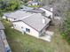 Aerial view of the home, backyard, and surrounding neighborhood at 16 Big Buck Trl, Ormond Beach, FL 32174