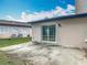 Backyard featuring concrete patio and mature trees at 16 Big Buck Trl, Ormond Beach, FL 32174