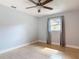 Cozy bedroom with a window and neutral walls at 16 Big Buck Trl, Ormond Beach, FL 32174