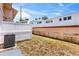Spacious backyard with patio, AC unit, and view of neighborhood at 1600 S Palmetto Ave # 105, South Daytona, FL 32119