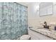 Cozy bathroom with a sink vanity, granite countertop and new faucet at 1600 S Palmetto Ave # 105, South Daytona, FL 32119