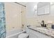 Cozy bathroom with a tub and granite countertop at 1600 S Palmetto Ave # 105, South Daytona, FL 32119