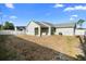 Spacious backyard with lush green lawn, perfect for outdoor entertaining at 1626 Lansfield Ave, Deltona, FL 32738