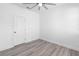 Bedroom with neutral walls, flooring, ceiling fan, and ample natural light at 1626 Lansfield Ave, Deltona, FL 32738