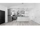 Modern kitchen with stainless steel appliances, granite countertops, and a stylish backsplash at 1626 Lansfield Ave, Deltona, FL 32738