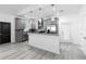 Beautiful kitchen with granite countertops, stainless steel appliances, and a modern design at 1626 Lansfield Ave, Deltona, FL 32738