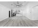 Spacious living room with an open-concept layout, perfect for entertaining guests and Gathering at 1626 Lansfield Ave, Deltona, FL 32738