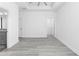 Main bedroom with modern ceiling fan, bathroom, and walk-in closet at 1626 Lansfield Ave, Deltona, FL 32738