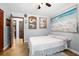 Bright bedroom featuring unique decor and tile floors, ideal for relaxation and style at 1690 S Adelle Ave, Deland, FL 32720
