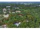 Large land plot surrounded by mature trees and lush greenery, enhancing privacy and natural appeal at 1690 S Adelle Ave, Deland, FL 32720