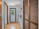 Clean laundry room with a door to the exterior and closet with louvered door at 1690 S Adelle Ave, Deland, FL 32720