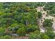 Aerial outline of the wooded property highlighting the generous land at 1690 S Adelle Ave, Deland, FL 32720