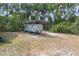 Dedicated RV parking with a covered structure, providing convenience and protection at 1690 S Adelle Ave, Deland, FL 32720