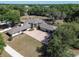 Aerial view of the estate with brick driveway and lush landscaping at 183 Mcgregor Rd, Deland, FL 32720