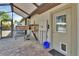 Back patio with a screened in area with pet door and exterior door at 183 Mcgregor Rd, Deland, FL 32720