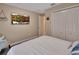Comfortable bedroom featuring closet and TV at 183 Mcgregor Rd, Deland, FL 32720