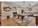 Entertainment room with a pool table, bar stools, and beverage-themed art, ideal for social gatherings at 183 Mcgregor Rd, Deland, FL 32720