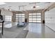 Spacious garage with room for exercise equipment and frosted glass doors at 183 Mcgregor Rd, Deland, FL 32720