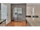 Modern kitchen with stainless steel refrigerator complementing sleek cabinets and granite countertops at 183 Mcgregor Rd, Deland, FL 32720