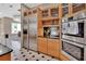 Kitchen features stainless steel appliances, granite countertops, and ample storage space at 183 Mcgregor Rd, Deland, FL 32720