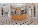 Gourmet kitchen with custom cabinetry, stainless steel appliances, and a large center island with bar seating at 183 Mcgregor Rd, Deland, FL 32720