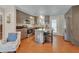 Modern kitchen with stainless steel appliances, sleek cabinets, and a center island with bar stool seating at 183 Mcgregor Rd, Deland, FL 32720
