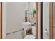 Utility room with basic plumbing fixtures, white walls, and concrete flooring at 183 Mcgregor Rd, Deland, FL 32720