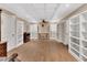 Large office area with built in bookshelves, recessed lighting, and tiled ceiling at 183 Mcgregor Rd, Deland, FL 32720