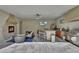 Outdoor kitchen with fireplace, tv, bar seating, and stainless steel grill at 183 Mcgregor Rd, Deland, FL 32720