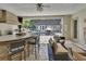 A full outdoor entertainment area featuring a pool, built in bar, and outdoor seating at 183 Mcgregor Rd, Deland, FL 32720