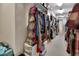Spacious walk-in closet featuring custom shelving and ample storage for clothes and accessories at 183 Mcgregor Rd, Deland, FL 32720