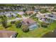 From above, the screened pool and water views stand out in this residential shot at 1860 Forough Cir, Port Orange, FL 32128