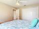 Bedroom featuring a closet, ceiling fan and nautical themed bedding at 1860 Forough Cir, Port Orange, FL 32128