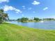 Scenic lake view with a fountain feature enhances the community's natural beauty at 1860 Forough Cir, Port Orange, FL 32128