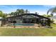 A backyard featuring a screened-in pool and patio, perfect for outdoor entertaining at 1862 Shelby Ter, Deltona, FL 32725